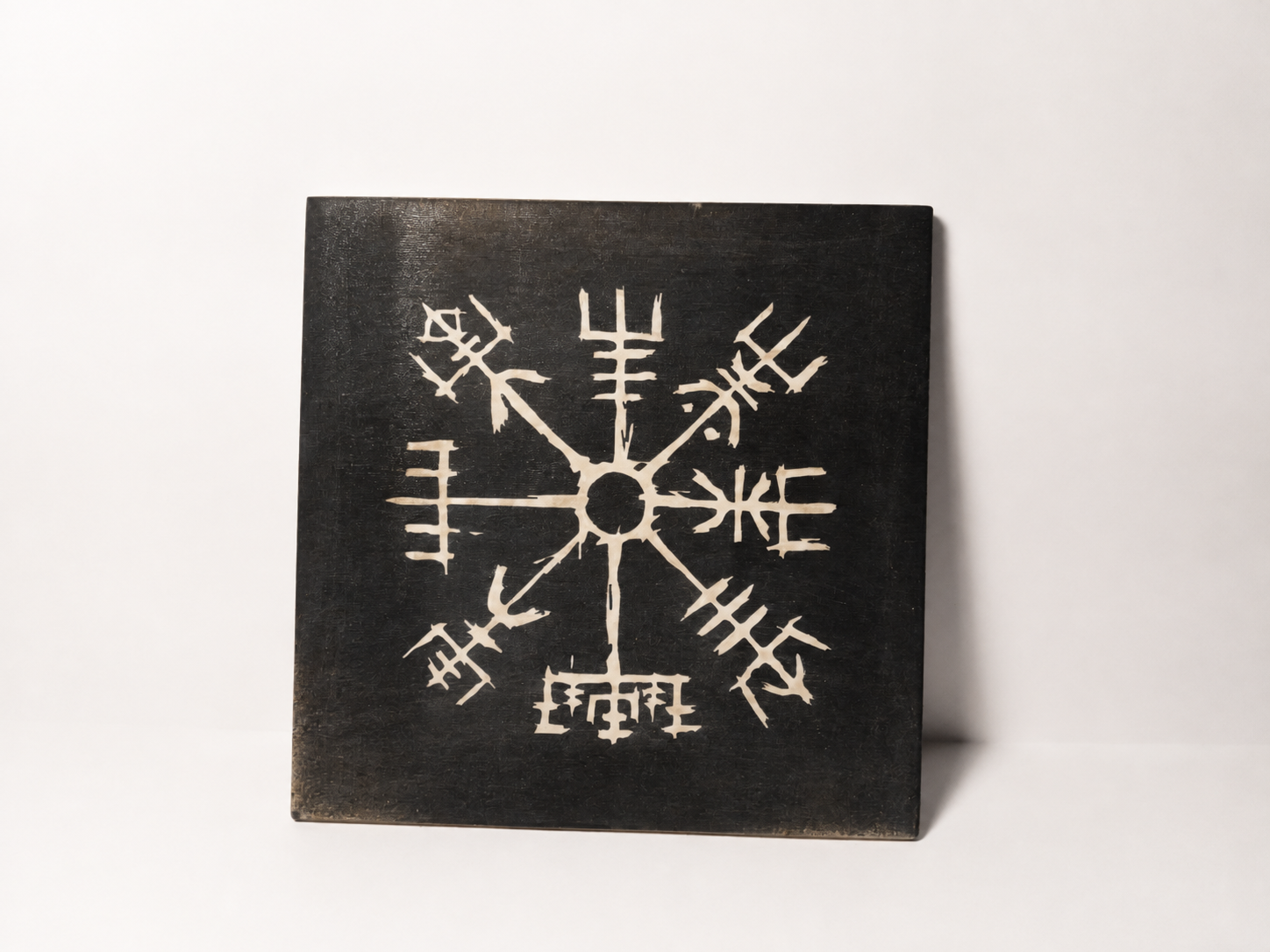 Square black slate tile with cream Vegvisir / Viking helm design