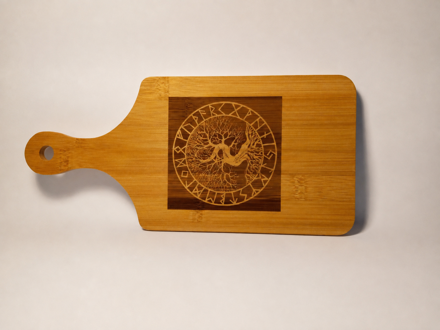 Bamboo breadboard engraved with Viking Tree of Life